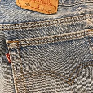 Vintage men’s 501 Levi jeans, distressed